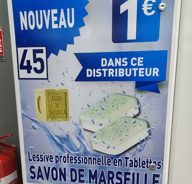 Distributeur lessive et adoucissant dans votre laverie automatique au 123 avenue Jean Jaurès 93120 La Courneuve